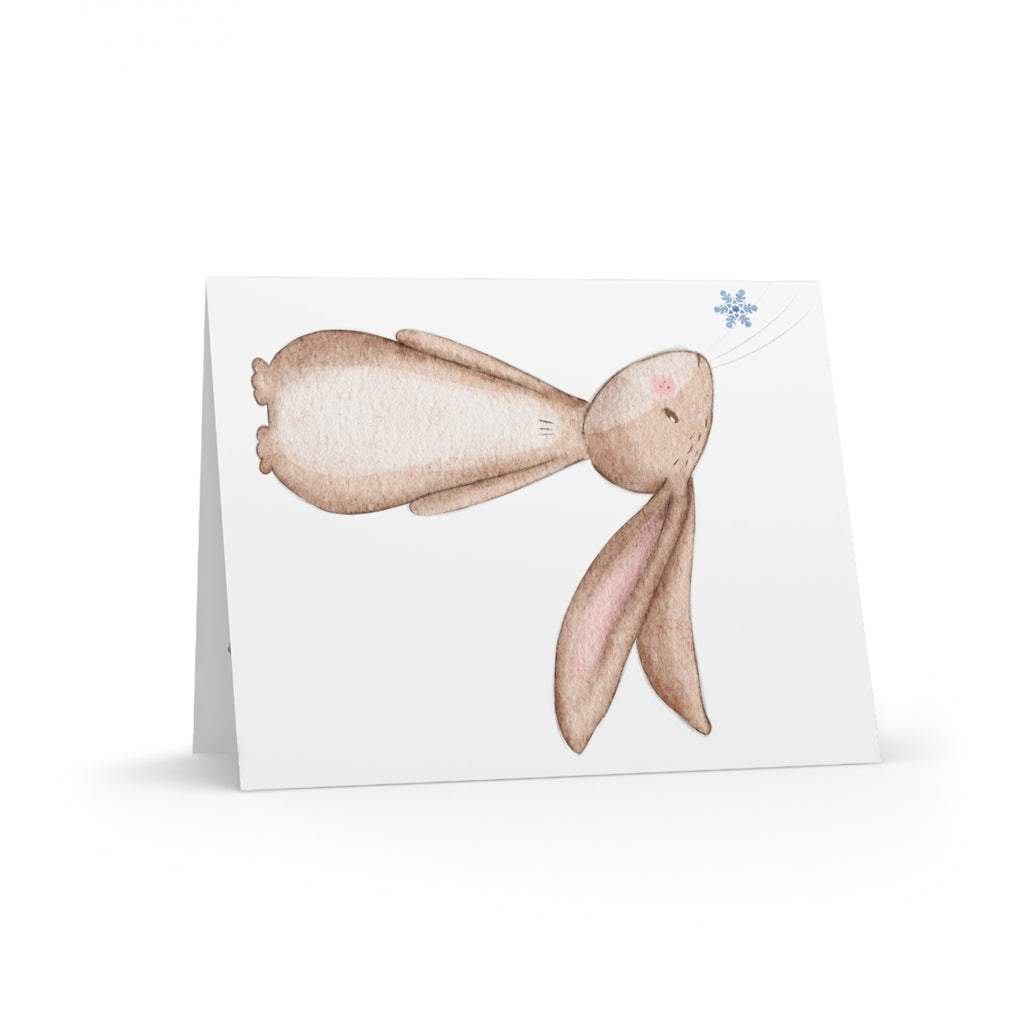 Bunny Looking at Snowflake Greeting Card | Cozy Winter Christmas Card | Woodland Holiday Design