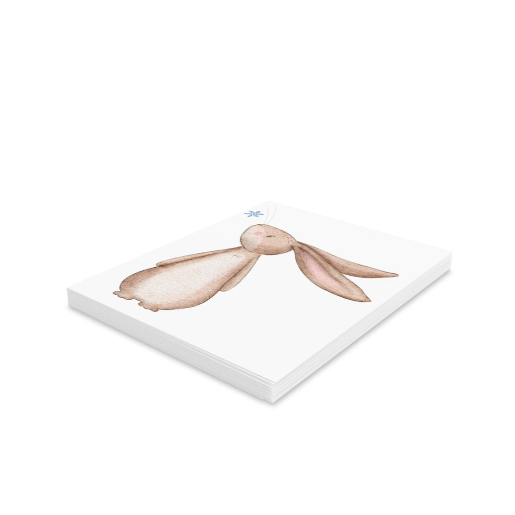 Bunny Looking at Snowflake Greeting Card | Cozy Winter Christmas Card | Woodland Holiday Design