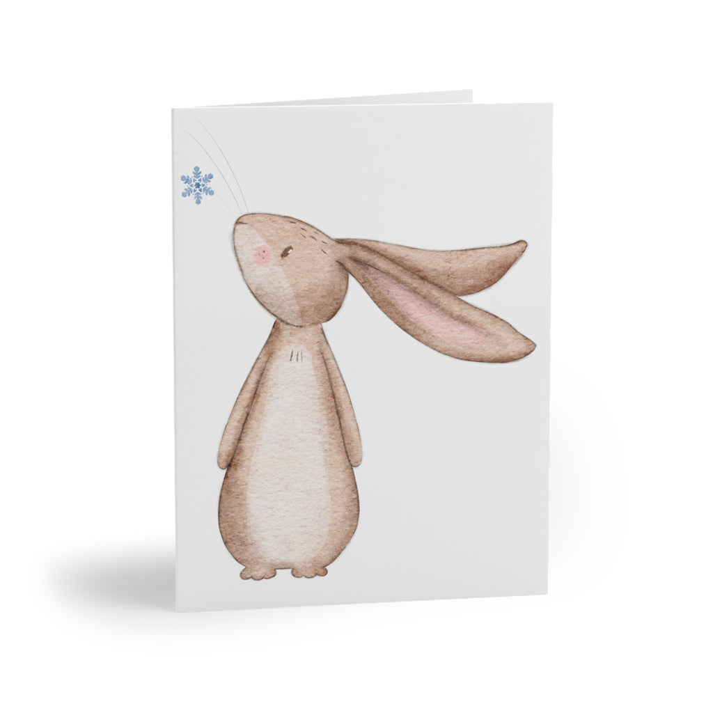 Bunny Looking at Snowflake Greeting Card | Cozy Winter Christmas Card | Woodland Holiday Design
